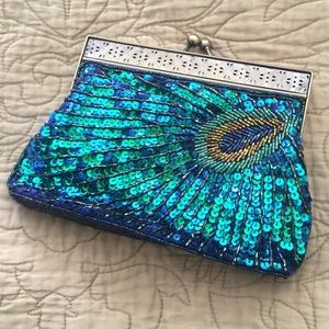 Beautiful sequined peacock clutch